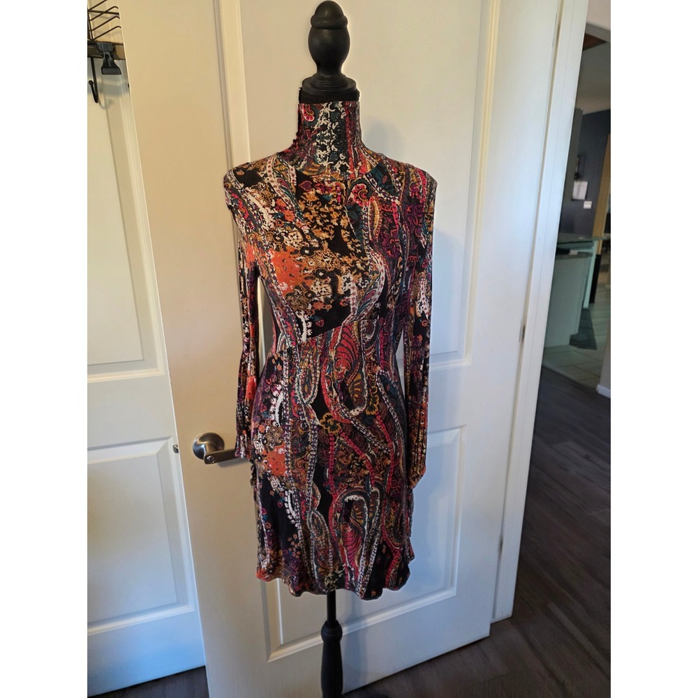 Free People turtleneck dress, cutout back,  long sleeves with ties on sleeves.